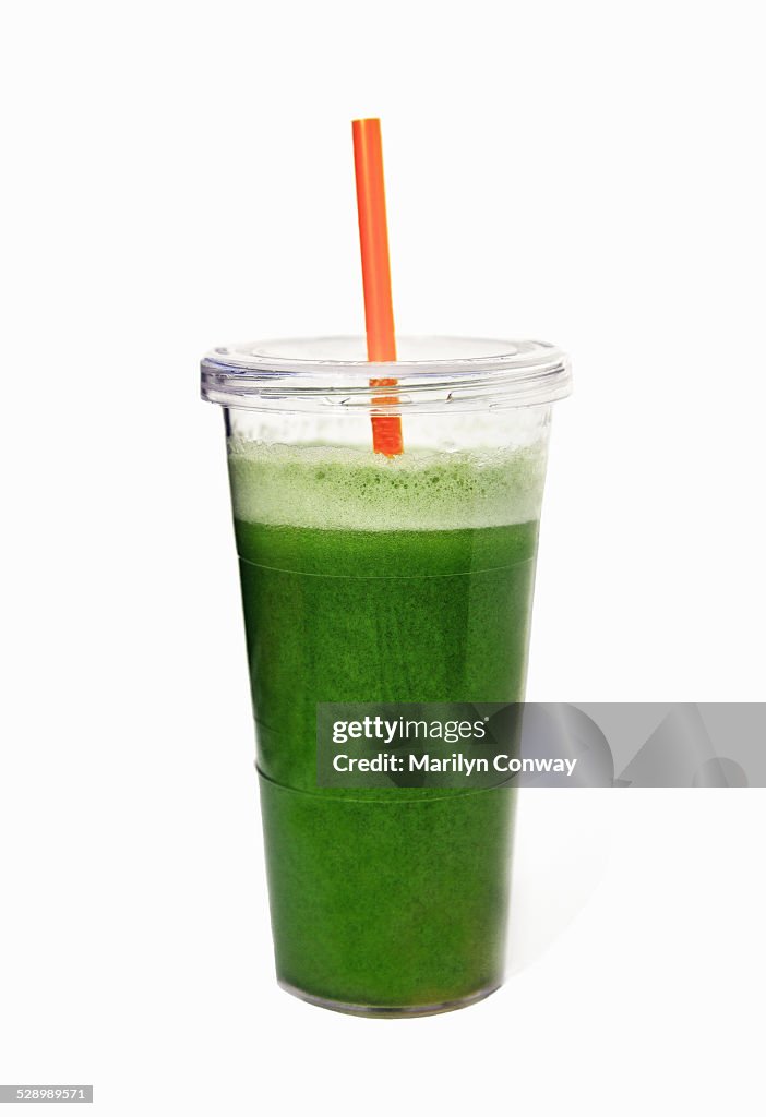Green juice on white background