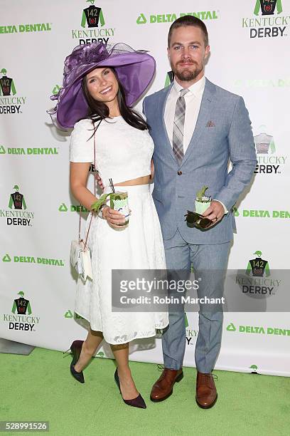 Actors Cassandra Jean and Stephen Amell attend the Delta Dental Celebrity Green Room during the 142nd Kentucky Derby at Churchill Downs on May 7,...