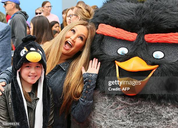 Actress Tia Carrere and Bianca Wakelin attend the premiere of "The Angry Birds Movie", in Westwood, California, on May 7, 2016. / AFP / Jean-Baptiste...
