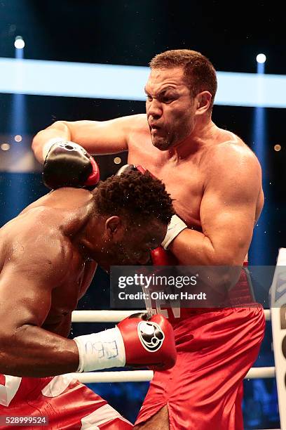 Kubrat Pulev of Bulgaria throws a punch at Dereck Chisora of Great Britain during Heavyweight European Championship between Kubrat Pulev and Dereck...