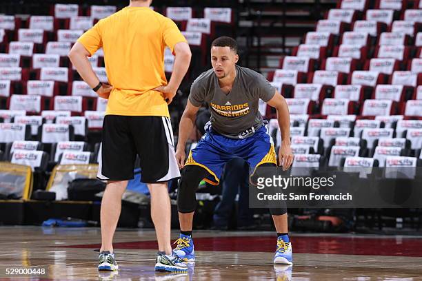 Stephen Curry of the Golden State Warriors warms up before the game against the Portland Trail Blazers in Game Three of the Western Conference...
