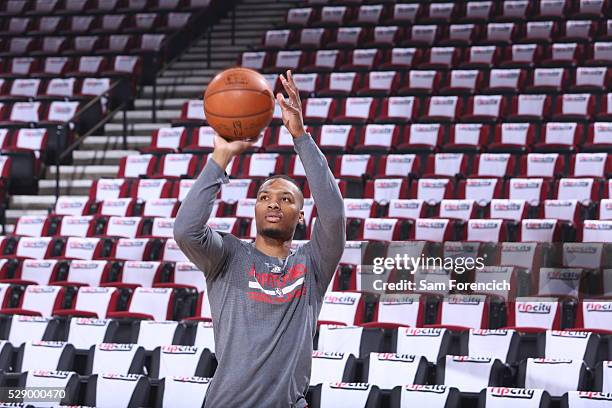 Damian Lillard of the Portland Trail Blazers warms up before the game against the Golden State Warriors in Game Three of the Western Conference...