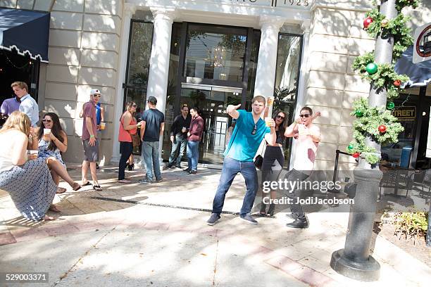 large group of young adults party in west palm beach - west palm beach stock pictures, royalty-free photos & images