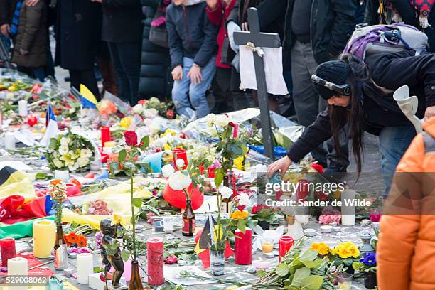 Brussels 23 March 2016. People from Brussels gathered at the Beurs square in the center of town to remember the victims of the terrorist attacks at...