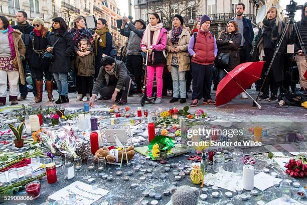 Brussels 23 March 2016. People from Brussels gathered at the Beurs square in the center of town to remember the victims of the terrorist attacks at...