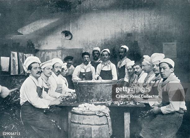 Some of the cooks preparing the soup at the Messagerie Van Gand, c1914. Cooks at the messagerie in Ghent prepare food for displaced Belgians during...