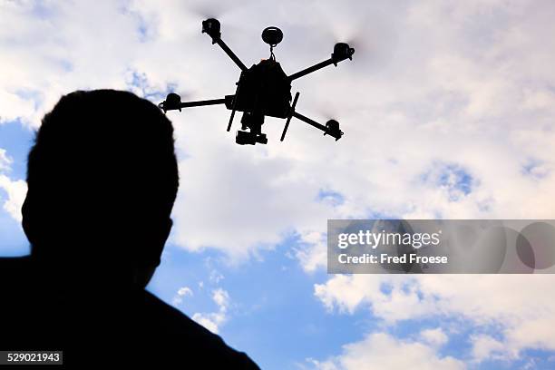 flying drone, octocopter - octocopter stock pictures, royalty-free photos & images