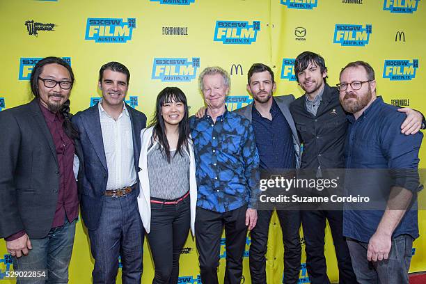 The Avett Brothers, Thao Nguyen, Terry Lickona and director Keith Maitland pose on the red carpet before the screening of 'A Song For You: The Austin...