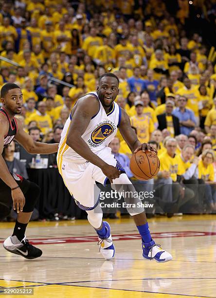 Draymond Green of the Golden State Warriors dribbles the ball against the Portland Trail Blazers during Game Two of the Western Conference Semifinals...