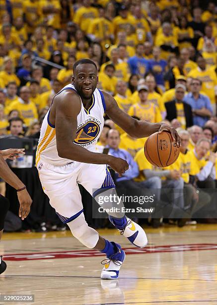 Draymond Green of the Golden State Warriors dribbles the ball against the Portland Trail Blazers during Game Two of the Western Conference Semifinals...