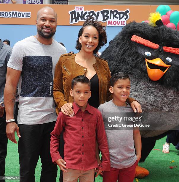 Gloria Govan, Derek Fisher and children Carter Kelly Barnes and Isaiah Michael Barnes arrive at the premiere of Sony Pictures' "The Angry Birds...