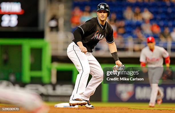 Chris Johnson of the Miami Marlins watches a play at third base during the second inning of a game against the Philadelphia Phillies at Marlins Park...