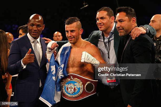 Former boxing champion Bernard Hopkins, David Lemieux and former professional boxer and founder of Golden Boy Promotions, Oscar De La Hoya pose...