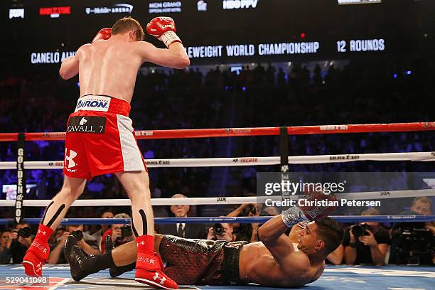 Canelo Alvarez throws a knockout punch at Amir Khan during the WBC middleweight title fight at T-Mobile Arena on May 7, 2016 in Las Vegas, Nevada.