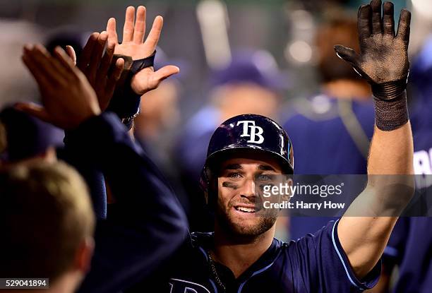Kevin Kiermaier of the Tampa Bay Rays reacts to his run to take a 4-2 lead over the Los Angeles Angels from a Logan Forsythe single during the ninth...