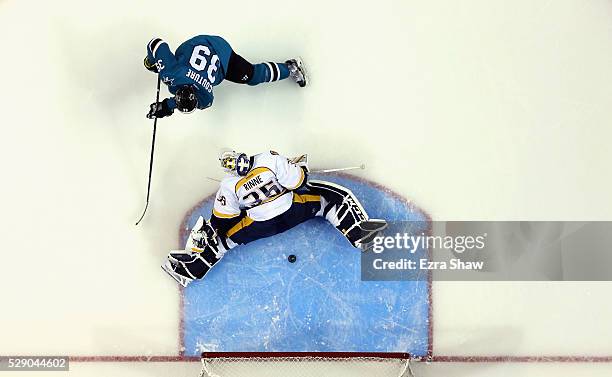 Logan Couture of the San Jose Sharks scores a goal past Pekka Rinne of the Nashville Predators in the second period of Game Five of the Western...
