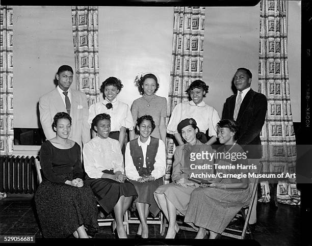 Group portrait of NAACP Youth Council seated from left: corresponding secretary Dorothy Kendrick, treasurer Adeline Blackman, president Gloria...