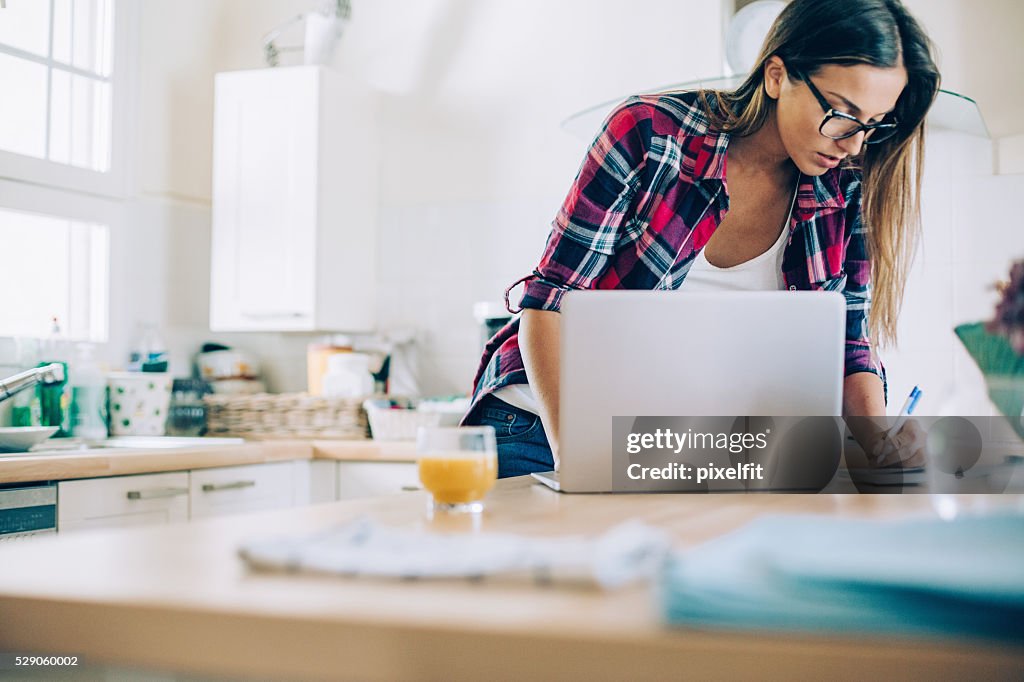 Young woman working from home