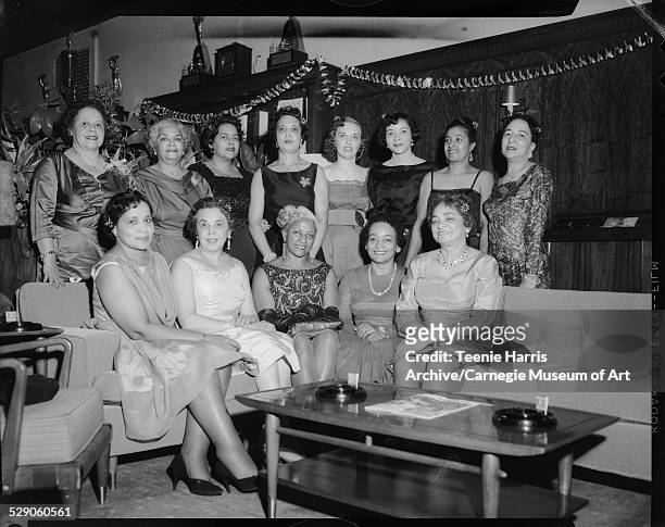 Members of the Girl Friends Inc., seated from left: Sara Goode, Ruth King, Ethel Ramos Harris, Hazel Garland, Marjorie Harris; standing: Wilhelmina...