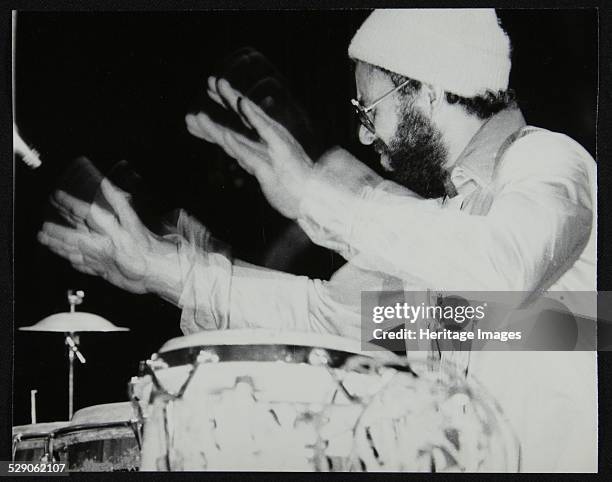 Percussionist Guilherme Franco playing with McCoy Tyner's band, Newport Jazz Festival, Ayresome Park, Middlesbrough, July 1978. Artist: Denis...