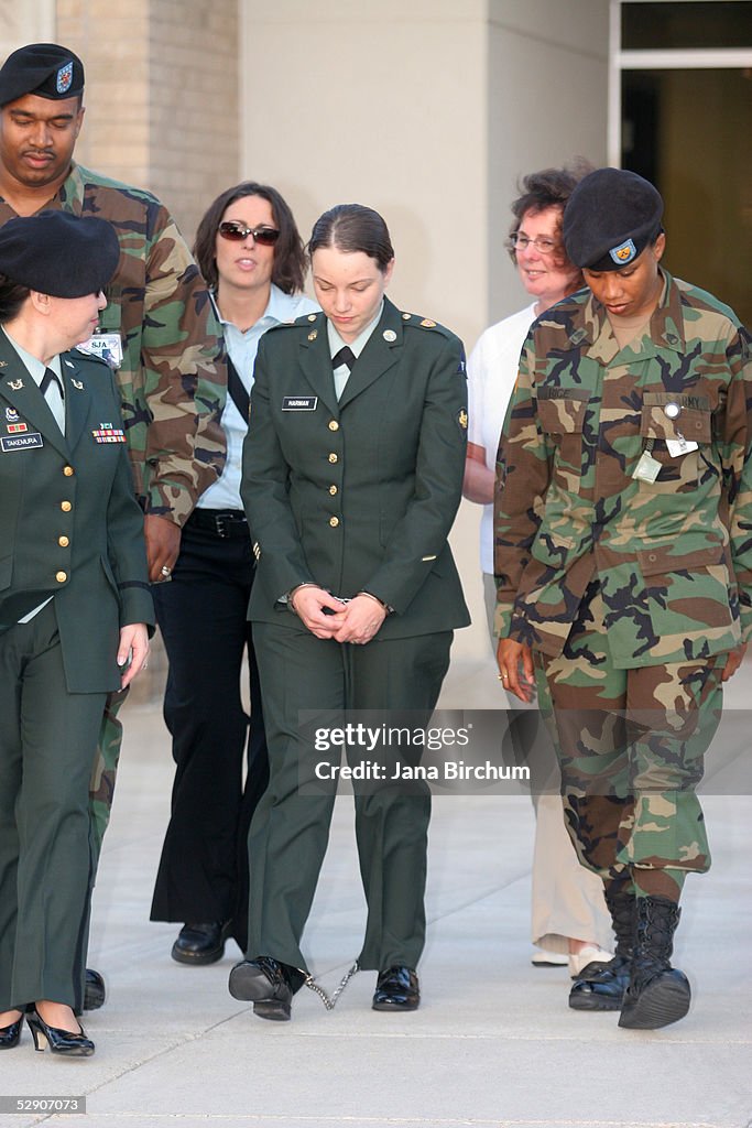 Specialist Sabrina Harman , accompanied by her military attorney