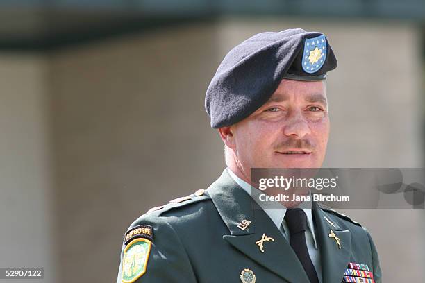 Major David W. Dinnenna, of the 372nd Military Police Company, which oversaw prisoners in Cell Block A at Abu Ghraib Prison in Iraq, leaves the...