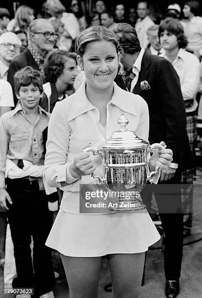 Chris Evert holding a trophy after a match; circa 1960; New York.