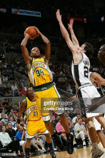 Ray Allen of the Seattle SuperSonics shoots over Manu Ginobili of the San Antonio Spurs in Game five of the Western Conference Semifinals during the...