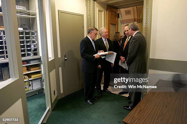 Senator Byron Dorgan , Sen Charles Schumer and Sen. Tim Johnson talk before speaking out on the proposed "nuclear option" proposed by Republican...