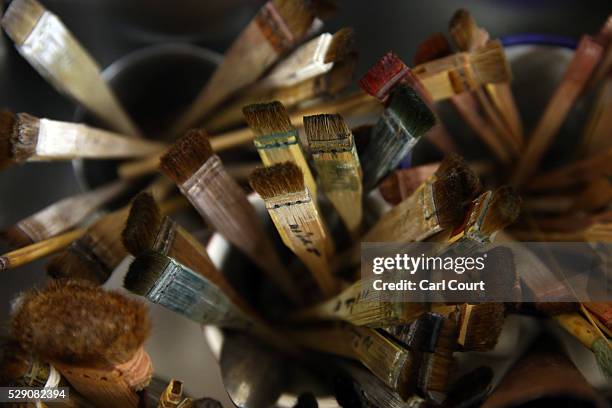 Brushes for colouring patterns on kimono fabric are dried at the Sensyo Ichikawa kimono workshop on April 26, 2016 in Kyoto, Japan. The workshop...