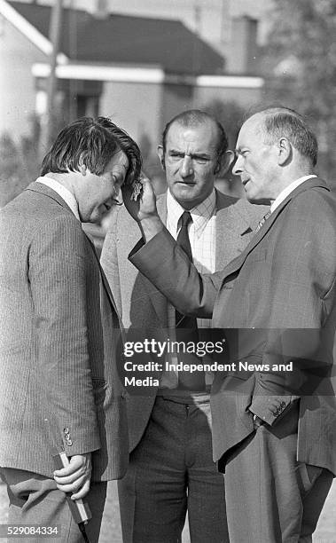 Detective Garda Michael Dowd who was grazed by a bullet with Det Insp Bill Somers and Assisant Commissioner John Paul McMahon at the scene of the...