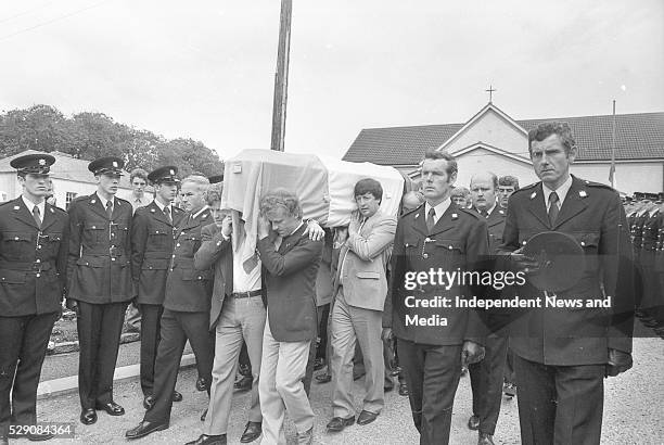 Funeral of Det Garda Hand who was shot dead by the IRA in the Drumree, Co Meath Post Office raid. Circa August 1984. .