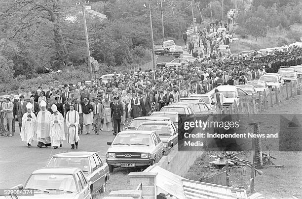 Funeral of Det Garda Hand who was shot dead by the IRA in the Drumree, Co Meath Post Office raid. Circa August 1984. .