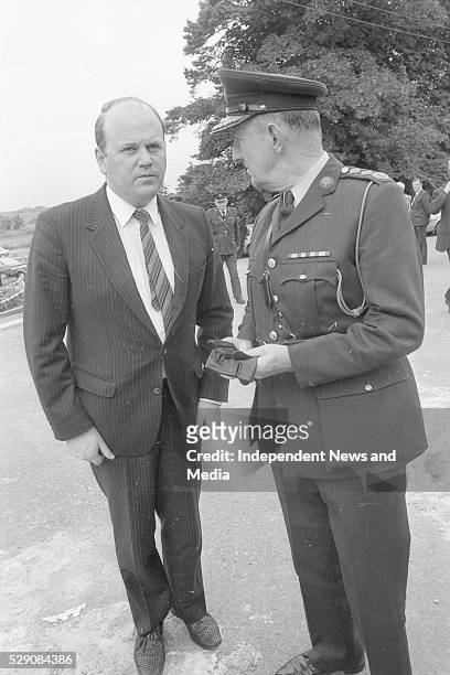 The Minister for Justice Michael Noona, TD and Garda Commissioner Larry Wren at the funeral of Det Garda Hand who was shot dead by the IRA in the...