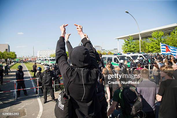 Left-wing activists protest while right-wing activists and Neo-Nazis march in the city center to demonstrate under the motto 'Merkel must go' against...