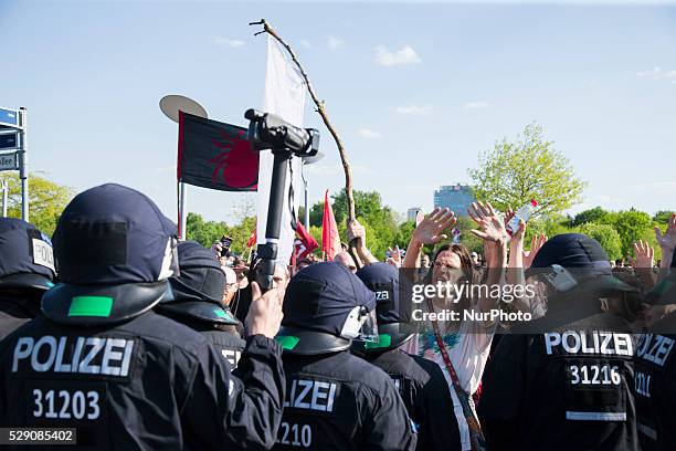 Left-wing activists protest while right-wing activists and Neo-Nazis march in the city center to demonstrate under the motto 'Merkel must go' against...