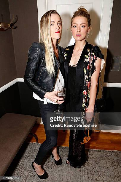 Whitney Heard and Amber Heard attend the Art of Elysium presents Tom Franco at the art salon on May 7, 2016 in Los Angeles, California.