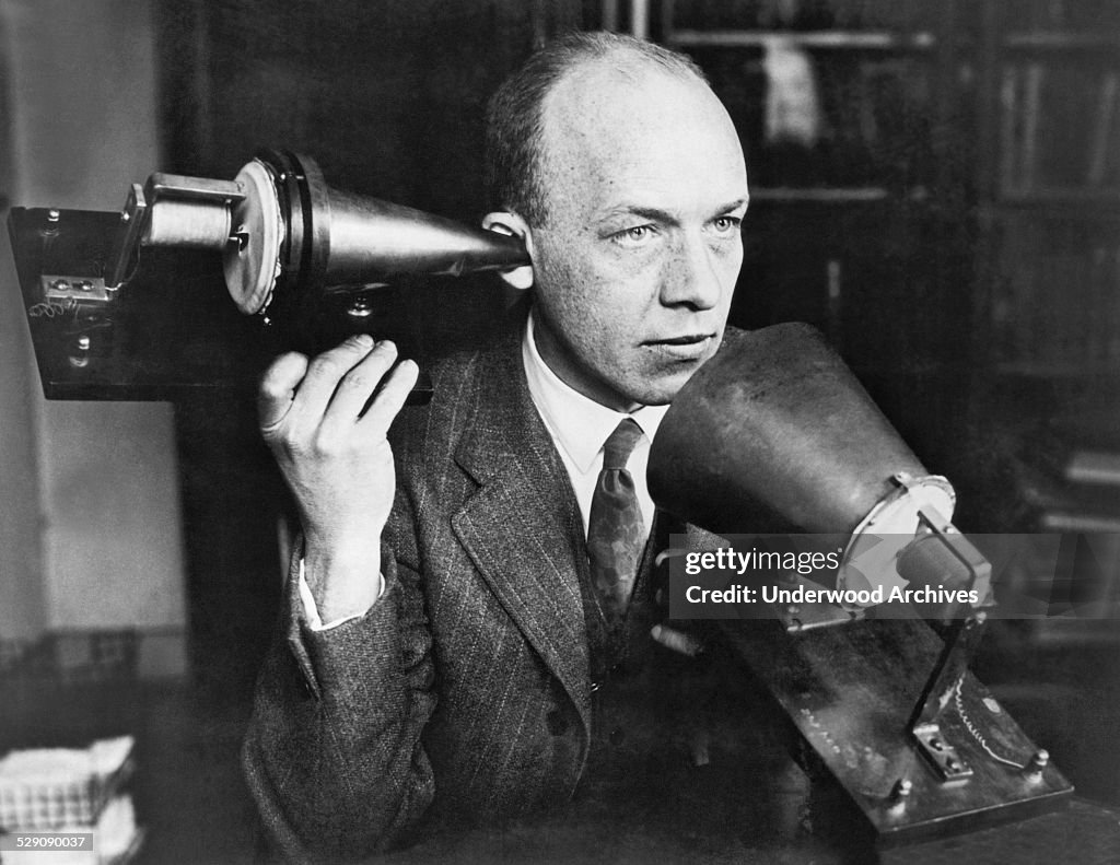 Man Using First Telephone