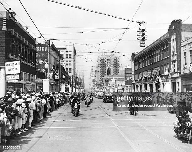 The crowds at the parade welcoming President Franklin Roosevelt as he arrived to speak at the Cotton Bowl, Dallas, Texas, June 13, 1936.