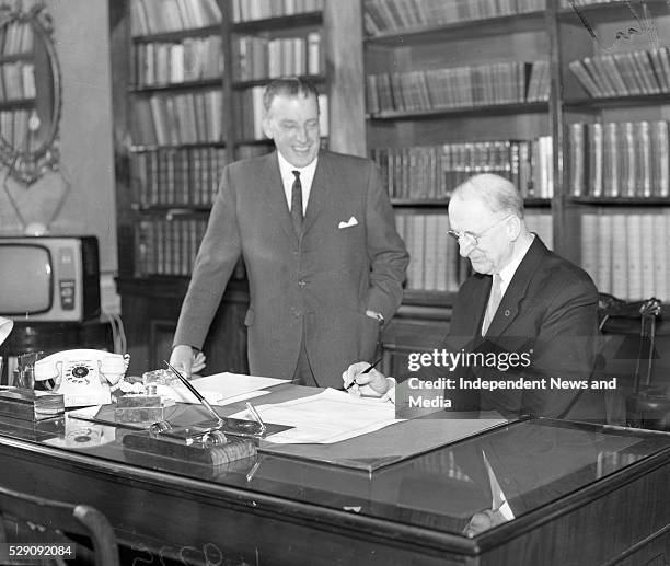 Taoiseach Mr Sean Lemass and President DeValera signing the proclamation to dissolve Dail Eireann, .