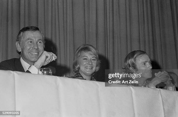 Dick Cavett Hope Lang and Johnny Carson seated on a dais at the Friar's Roast; circa 1960; New York.