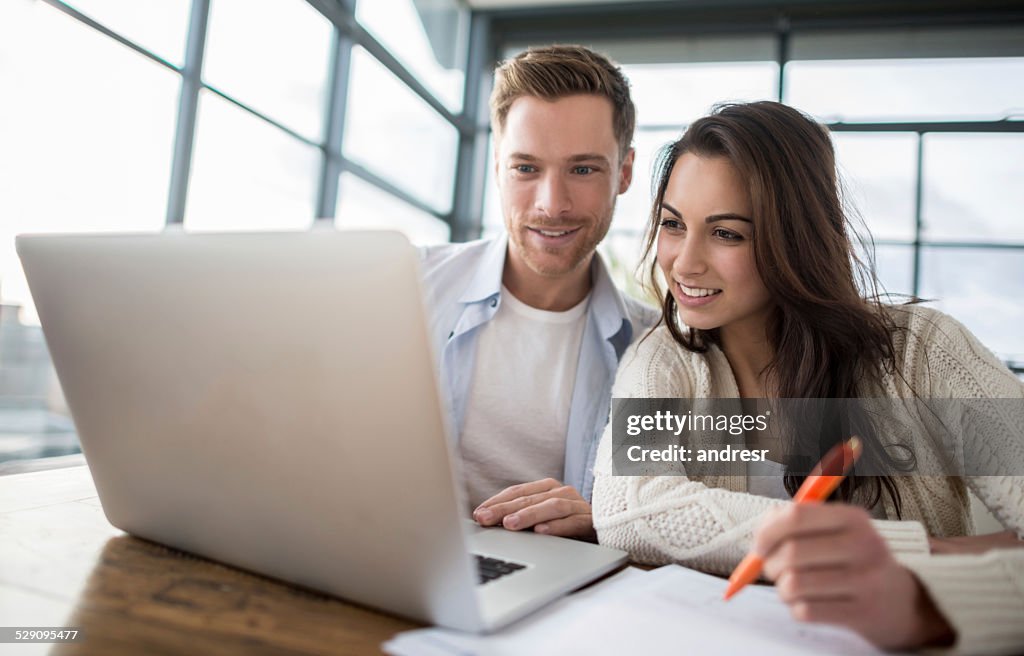 Couple checking home finances