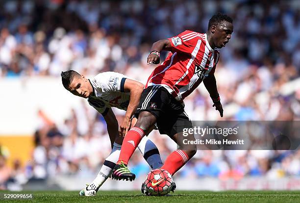 Victor Wanyama of Southampton takes on Erik Lamela of Tottenham Hotspur during the Barclays Premier League match between Tottenham Hotspur and...