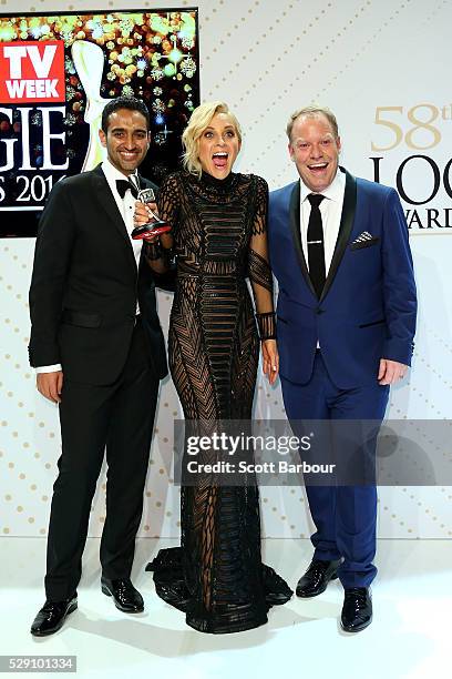 Waleed Aly, Carrie Bickmore and Peter Helliar pose with the Logie Award for Best News Panel Or Current Affairs Program 'The Project ' during the 58th...