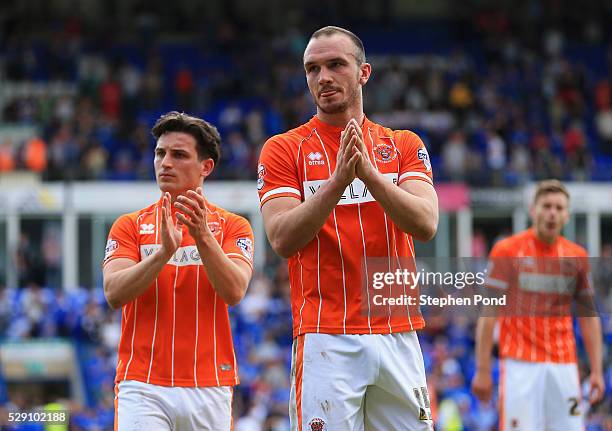 Tom Aldred and Jack Redshaw of Blackpool looks dejected as they are relegated after the Sky Bet League One match between Peterborough United and...