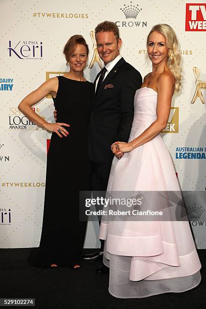 Actor Craig McLachlan poses for a photo with partner Vanessa Scammell and fellow actor Nadine Garner at the 58th Annual Logie Awards at Crown...