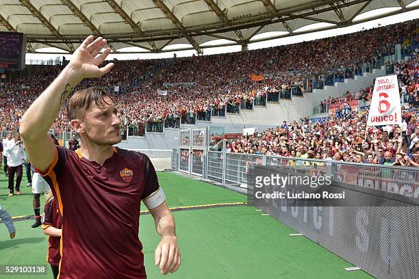 Roma captain Francesco Totti greets his fans after the Serie A match between AS Roma and AC Chievo Verona at Stadio Olimpico on May 8, 2016 in Rome,...