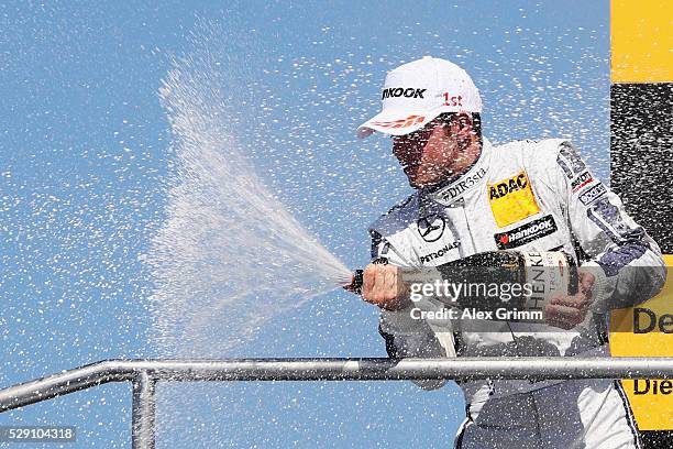 Paul di Resta of Great Britain and Mercedes team HWA celebrates winning race 2 of the DTM German Touring Car Hockenheim at Hockenheimring on May 08,...