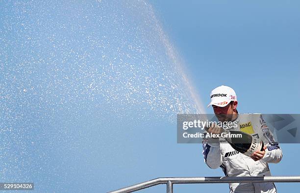 Paul di Resta of Great Britain and Mercedes team HWA celebrates winning race 2 of the DTM German Touring Car Hockenheim at Hockenheimring on May 08,...