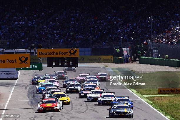 Paul di Resta of Great Britain and Mercedes team HWA leads the field after the start of race 2 of the DTM German Touring Car Hockenheim at...